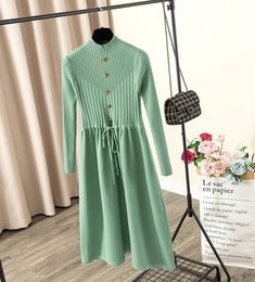 Elegant Knit A Line Drawstring Pleated Midi Dress | Uniqistic.com Casual Midi Dress With Buttons For Winter, Casual Buttoned Midi Dress For Winter, Casual Winter Midi Dress With Buttons, Spring Long Sleeve Sweater Dress With Button Closure, Long Sleeve Sweater Dress With Button Closure For Spring, Midi Dress Green, Sweater Dress Casual, Fall Winter Dresses, Dress Autumn