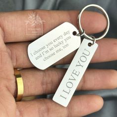 someone is holding their keychain that says i choose you every day and my so lucky you choose me