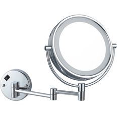 a round mirror mounted on the wall next to a magnifying glass holder with two arms