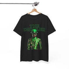 Diddy Funny The Diddler Meme Shirt Unleash your sense of humor with the Diddy Funny The Diddler Meme Shirt! This unique unisex heavy cotton tee brilliantly fuses pop culture with playful wit, featuring a hilarious depiction of P Diddy as "The Diddler," inspired by the iconic Riddler character. Whether you're a fan of hip-hop, memes, or just love a good laugh, this shirt is bound to turn heads and spark conversations. Design Highlights: Eye-Catching Graphics: The shirt showcases a whimsical design of P Diddy in a vibrant, cartoonish style, donning the classic green and question mark motif of the Riddler, but with a humorous twist. Colorful and Bold: Available in a variety of colors, this tee is perfect for anyone looking to make a statement. The bold graphics stand out on any backdrop, ensu Cheap Pop Culture T-shirt With Funny Print, Prison Humor, The Riddler, Puff Puff, Internet Culture, Hip Hop Culture, Running Errands, Heavy Cotton, Cotton Tee