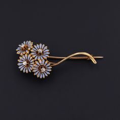 Daisies are historically a symbol of purity, innocence, and loyal love and commonly carried by brides on their wedding day. This antique brooch (circa 1910-1920) features a bouquet of 14k gold daisies adorned in light blue enamel and accented with diamonds. The piece measures 0.8 inches by 1.7 inches wide, and it is in good condition with minor enamel loss visible under magnification. We have many other fantastic offerings of period fine jewelry posted on our Etsy store, so please consider brows Jewelry Post, Antique Brooches, Antique Diamond, Enamel Jewelry, Antique Shops, Estate Jewelry, Jewelry Findings, Antique Jewelry, Ring Earrings