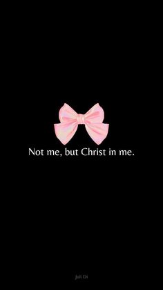 a pink bow with the words not me, but christ in me