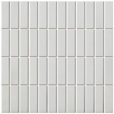 a white tile wall that is very close up