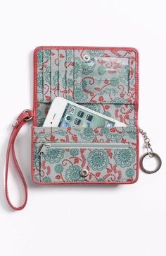 a cell phone is sitting in a purse