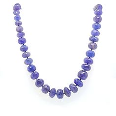 245 Carat Total Weight Faceted Tanzanite Bead Necklace Featuring a 14 Karat Yellow Gold Pearl Clasp. 72 Beads Measure 6-10mm and 18 Inches Long. Luxury Faceted Round Beads Necklace, Luxury Sapphire Gemstone Beads Necklace, Taaffeite Necklace, Pearl Clasp, Gold Pearl, Bead Necklace, Gemstone Necklace, Free Gifts, Beaded Necklace