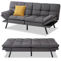 a gray couch and ottoman sitting next to each other