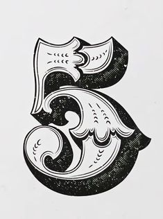 the number three is made up of black and white ink, with an intricate design on it