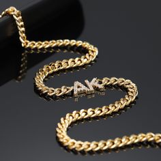 Personalize this cuban chain with your initials or surprise them with a meaningful gift. Gold Cuban Link Necklace Gift, Initial Pendant Necklace With Curb Chain, Yellow Gold Figaro Chain Necklace With Initial Pendant, Cuban Link Necklace With Adjustable Chain For Gift, Gold Plated Cuban Link Chain Necklace For Gift, Initial Pendant Jewelry With Curb Chain For Gift, Personalized Gold Cuban Link Name Necklace, Gift Jewelry With Initial Pendant And Curb Chain, Classic Initial Pendant Necklace With Chain