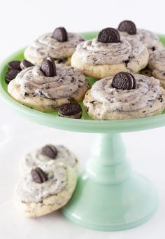 cookies with chocolate chips and oreos on a green cake plate, ready to be eaten