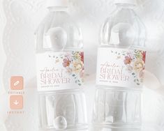 two water bottles with wedding favors in them on a white tableclothed background and the label says, just married bridal shower