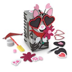 an assortment of valentine's day decorations and crafts