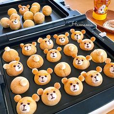 there are many cookies shaped like teddy bears on the baking sheet and ready to go in the oven