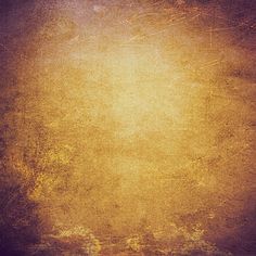 an old grungy textured background in yellow and brown