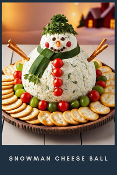 a snowman cheese ball on a platter with crackers