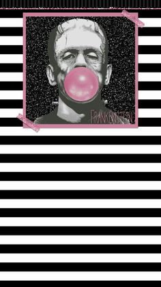 a black and white striped wall with a pink bubble in front of a man's face