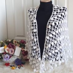 This cozy shawl is perfect for layering over your outfits, adding a touch of sophistication and style. Its generous size allows for versatile styling, whether you choose to wear it as a wrap, a scarf, or a light blanket. Crafted with care, this shawl is not just an accessory but a statement piece that will keep you snug and chic all season long! Crochet Shawl Wrap For Winter, Crochet Wrap, One Size For Winter, Crochet Wraps One Size For Winter, Winter Crochet Shawl Wrap, One Size Crochet Wrap For Winter, Handmade White Shawl For Spring, White Handmade Shawl For Spring, Cozy Shawl Wrap Scarf, Winter Shawl For Layering