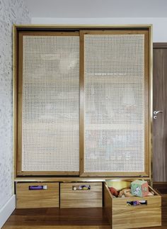 an open wooden cabinet with two drawers