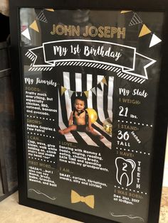 a black and white birthday poster with gold accents on it's frame, featuring a photo of a baby