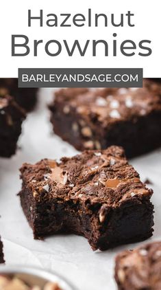 chocolate brownies with nuts on top and the words hazelnut brownies above it