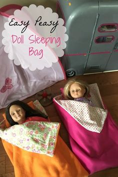 two dolls are laying on the floor next to an easy peasy doll sleeping bag