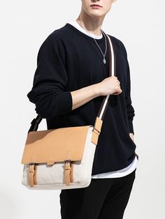 Editor's NotesThe simple cross bag that is made of cow leather and canvas material is featuring polygon detail.- Cow leather, canvas material- Enough space to store- Adjustable strap and buckle- Cross bag- Double belt closureMeasurements(in.)- Size: 12.59 in. (W) / 9.84 in. (H) / 2.75 in. (D)Composition & Care- Cow leather, Canvas- Professional cleaning is recommendedDesigner- by BEDFORD 11TH Modern Canvas Satchel, Rectangular Canvas Shoulder Bag For Business, Business Canvas Shoulder Bag, Rectangular, Leather Canvas Bag With Detachable Strap For Everyday, Modern Canvas Crossbody Satchel, Everyday Leather Canvas Bag With Detachable Strap, Cream Shoulder Bag With Leather Trim, Modern Leather Crossbody Canvas Bag, Leather Crossbody Canvas Bag