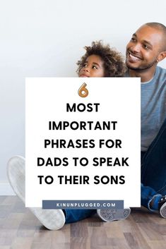 a father and daughter sitting on the floor holding a sign that says most important phrases for dads to speak to their sons