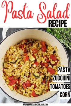 pasta recipe in a pan with tomatoes, zucchini and corn on the side