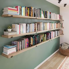 the bookshelves are filled with many different types of books