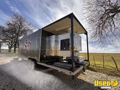 a truck that is sitting in the dirt