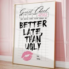 a poster with the words better late than ugly on it in front of a pink wall