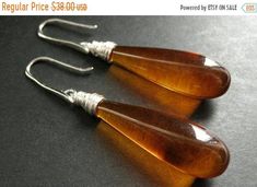 EASTER SALE Long Earrings. Amber Earrings. Extra Long Teardrop Earrings Wire Wrapped in Silver. Handmade Jewelry. by TheTeardropShop from The Teardrop Shop. Find it now at https://ift.tt/3reQrOj! Wire Earrings Handmade, Silver Handmade Jewelry, Jewelry Design Inspiration, Wire Jewelry Designs, Earrings Wire, Amber Earrings, Handmade Wire Jewelry