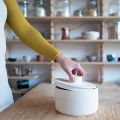 The ceramic food container is handmade in Slovenia on a spindle from natural-coloured chamotte clay and is surrounded by a matt white glaze on the inside. It is designed to store flour, cereals, or other foods that need to be stored in a dark place. The container is double-fired, resistant to crumbling and therefore everlasting. It is suitable for storing a good kilo of flour, and there are three different container shapes, all dishwasher safe. The container is not airtight and is not glazed on Flour Storage, Flour Container, Jar Tea, Countertop Oven, Bread Storage, Ceramic Jars, Dark Places, Different Textures, White Glaze