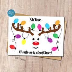 a christmas card with reindeer's head and lights on it, says oh dear christmas is almost here