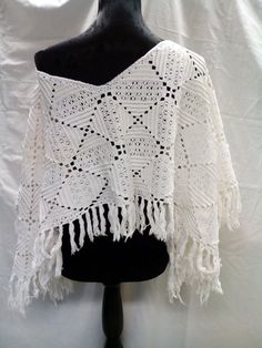 Bridal white crochet lace capelet,recycled, women,handmade, shawl,poncho,cotton. This is upcycled.It is made from an old tablecloth. Sometimes I'm in fantasy mood, so I made it:) It is one of my favorite . It's unique, handmade with love, only one, only for you. Size free Thanks for your interest in my shop. Hope you find something made for you:) https://www.endladisain.ee White Handmade Bohemian Crochet Top, White Bohemian Poncho With Fringe, White Handmade Bohemian Poncho, White Bohemian Poncho For Festivals, White Bohemian Poncho Shawl, White Vintage Crochet Top For Festivals, White One Size Bohemian Poncho, White One Size Crochet Top, Lace Capelet