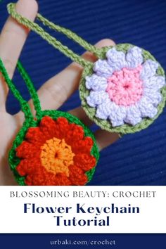 a crochet flower keychain is shown with the text, blossoming beauty crochet