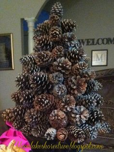 a christmas tree made out of pine cones