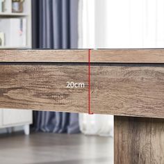 a wooden table with measurements on it