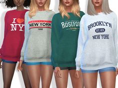 four different colored sweaters with new york on them