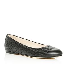 These Amazingly Versatile Bottega Veneta Ballerina Flats Display The House's World-Renowned Woven Leather. Bottega Veneta Signature Intrecciato Woven Leather. Cap Toe. 1/4" Flat Heel. Padded Leather Insole. Made In Italy. About Bottega Veneta: It Was 1966 In Vicenza, Italy, When Vittorio And Laura Moltedo Introduced Bottega Veneta With A Collection Of Buttery Soft Leather Handbags. The Line's Signature Intrecciato Weave Set The Bags Apart And Made Them Must-Haves. Over The Years, Bottega Veneta Bottega Veneta Ballet Flats, Luxury Black Flats With Removable Insole, Luxury Black Flats With Almond Toe, Luxury Black Almond Toe Flats, Elegant Woven Leather Closed Toe Flats, Luxury Black Flats With Rubber Sole, Chic Intrecciato Weave Flats, Formal Woven Leather Flats With Round Toe, Vicenza Italy