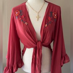 Embroidered Floral Detail Cardigan With Wide Sleeves Front Tie Gorgeous Embroidered Cardigan Features Bell Sleeves. Can Be Worn Tied Or Open Polyester. Size Small 4/6 Medium 8/10 Boho Bohemian Dreamy 70s Retro Western Babe Festival Travel Fashion Vacation Babe Concert Party Brunch Red Bohemian Spring Cardigan, Red Embroidered Long Sleeve Cardigan, Red Long Sleeve Cardigan For Festivals, Red V-neck Cardigan For Spring, Red V-neck Spring Cardigan, Red V-neck Summer Cardigan, Embroidered Open Front Cardigan, Red Open Front Tops For Spring, Red Open Front Cardigan For Spring