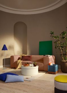 The Broste Copenhagen Lagoon three Seater Sofa in colourful living room interior with cosy throws and books to read. Broste Copenhagen, Three Seater Sofa, Warm Grey, Table Storage, Chandigarh, Outdoor Lounge, Cozy Living, Home Rugs, Style Retro