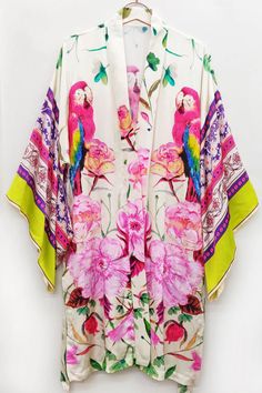 ED24B67 Parrot/floral print belted kimono with beading on front, floral border print sleeves Ivory parrots print Dry clean only 100% modal Elvis Presley Gifts, Flare Jeans Shoes, Belt Kimono, Maxi Jumpsuit, Border Print, Dry Clean Only, Childrens Gifts, Retro Shirts, Floral Border