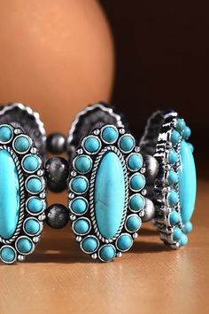 This Navajo Western Natural Stone Stretch Bracelet is a fashionable accessory for everyone's jewelry box! It features beautiful stones in a modern style bracelet design to add some serious bling to your evening wardrobe. Come on, rock this bracelet! *APPROX. L 8.25" Diameter 2.5" Western Bracelets, Beautiful Stones, Bracelet Design, Turquoise Stones, Stretch Bracelet, Turquoise Stone, Bracelet Designs, Stretch Bracelets, Fashion Bracelets