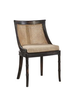 a wooden chair with woven seat cushion