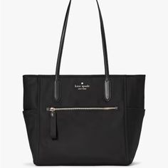 Nwt, Kate Spade Black Nylon Chelsea Tote Bag! Product Details Measurements 12.4" H X 6.8" D Width: 13.4"W (Bottom) 17.2"W (Top) Features Metal Pinmount Logo Closure Type: Drop In Top Zip Closure Interior: Front Slip, Front Credit Card Slots, Key Leash, & Back Zip Pockets Exterior: Top Zip Pocket, Front Zip Pocket, 2 Side Pockets, Back Zip Pocket To Slide On Trolly Handles Materials 100% Recycled Nylon Trim: Smooth Pvc Trim Brand New With New Tags! Smoke Free Home. Polka Dot Tote Bag, Felt Tote, Pvc Trim, Reversible Tote Bag, Kate Spade Cameron Street, Vintage Kate Spade, Laptop Tote, Kate Spade Totes, Kate Spade Tote Bag