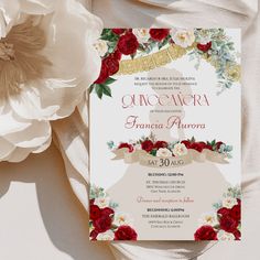 a wedding card with flowers and ribbon on it