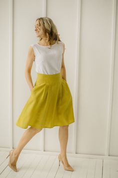 "Linen Pleated Skirt, Yellow Linen Skirt, Linen Retro Skirt Every item is handmade to order and to your personal body measurements (made to measure). DESCRIPTION: -High Waist -Pleats from the waist down -Pockets -Mid Length -Handcrafted Color in the picture- spring yellow and green grey. Other colors are available. ETHICALLY MADE. Every linen garment is handmade using the body measurements of the individual customer. No factory use. Every creative and sewing task is fairly rewarded. Material: 10 Linen Wedding Dress, Linen Midi Skirt, Skirt Flowy, Linen Wedding, Skirts Flowy, Skirt Linen, Lindy Hop, Belle Silhouette, Retro Skirt