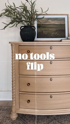 a wooden dresser with a potted plant on top and the words no tools flip written across it