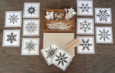 several snowflakes are shown on the floor with some rubber stamping and glue