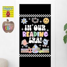 a poster with the words in our reading era on it next to a potted plant